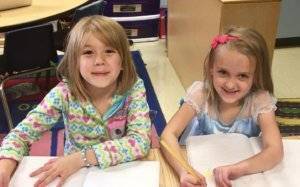 two dcg preschool students smiling